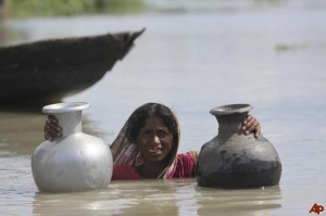 The individuals behind the climate change headlines. Flooding in India, 2009.